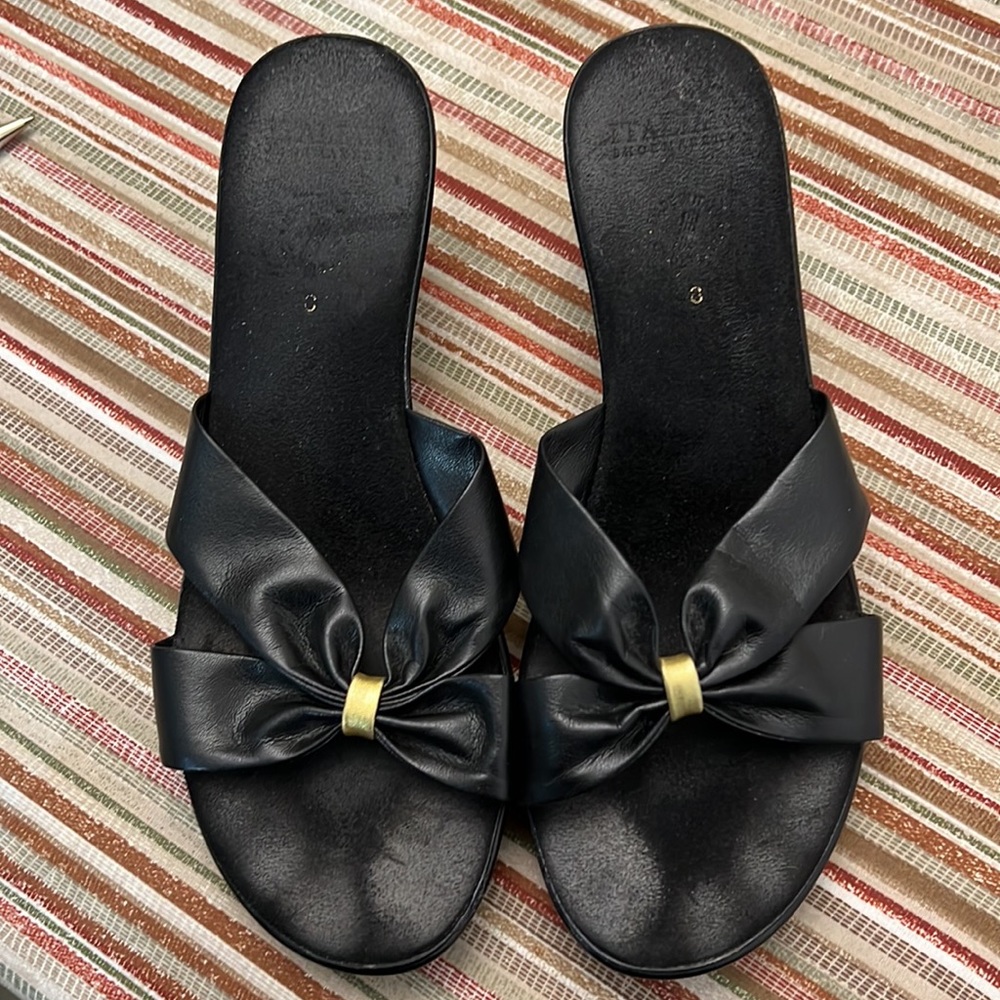 Italian Shoemaker Black Wedge 2-1/2” Slide Heeled Sandals with Gold Accent